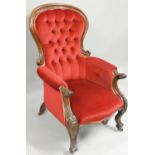 A Victorian mahogany parlour chair, with carved scroll arms and legs, button back upholstery, 109