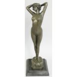 An Art Deco style bronze, named Reveil, depicting a naked lady stretching, signed in the cast