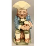 An 18th century Ralph Wood pearlware Toby Jug, with foaming mug, decorated with a blue coat and