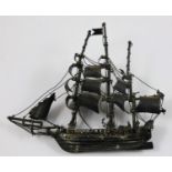 A Mexican silver model of a galleon, stamped NAVA, STERLING, MEXICO, well detailed with rigging,