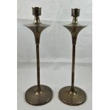 A silver pair of candlesticks, Birmingham 2007, of slender form and pronounced drip pan, height 30