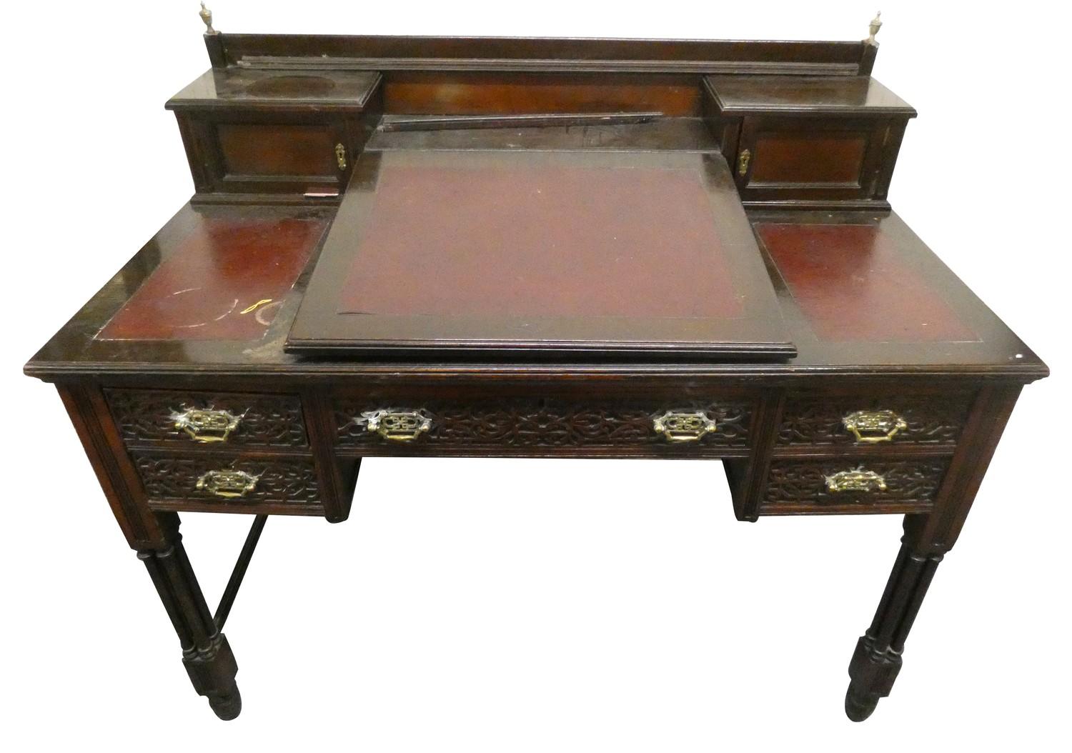 Maple & Co., London, a ladies mahogany writing desk, the leatherette fall front opening to reveal