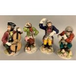 A set of four late Dresden Monkey Band figures, crossed sword mark and impressed marks; conductor,