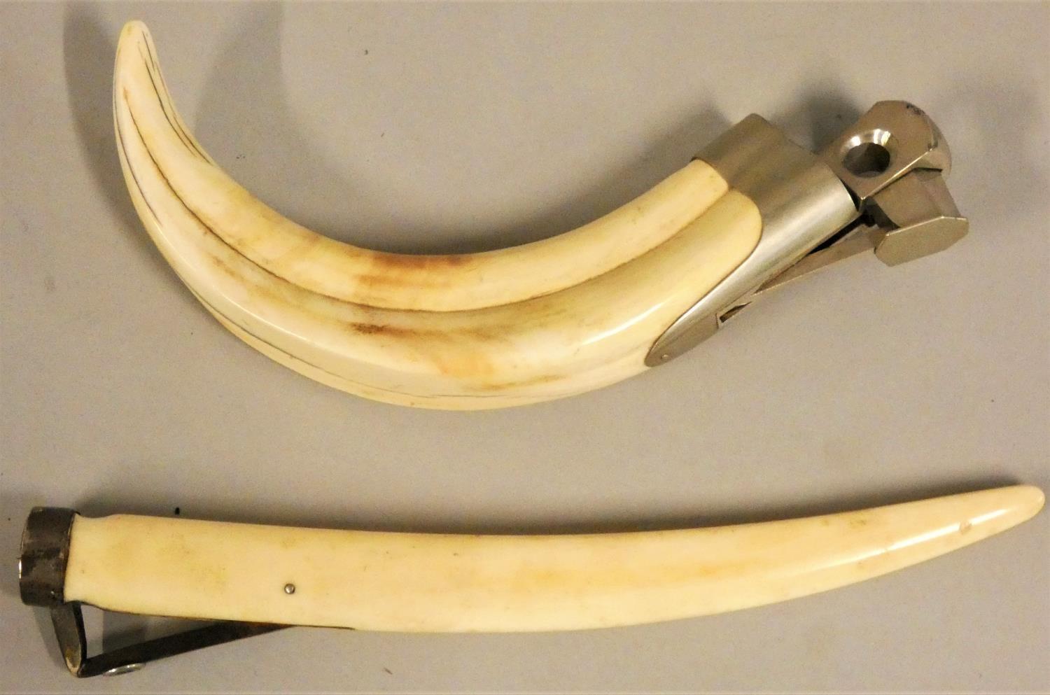 A Victorian silver mounted ivory cigar piercer, Birmingham 1896, 22 cm, together with metal