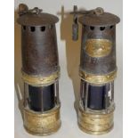Two vintage brass and iron miners lamps, one with applied plaque ?Ackroyd & Best Ltd Morley