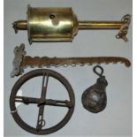 A 19th century clockwork bottle jack roasting spit, with key and cast iron balance wheel, the