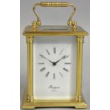 Rapport, London, a brass striking carriage clock, the white enamel dial with Roman numerals, the