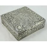A Victorian silver box, by Nathan & Hayes, Chester 1900, the hinged cover with embossed and chased