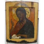 A Russian icon of Christ Pantocrator, tempera on an arched wood panel, with Cyrillic inscription, 53