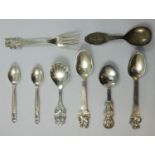 Georg Jensen, two acorn pattern tea spoons, London import 1928, a Danish silver caddy spoon, by