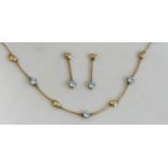 A 9ct gold and blue zircon necklace and ear rings, the brilliant cut stones alternately set with