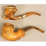A Victorian meerschaum pipe, carved to depict a lady with hat, silver mount, Chester 1899, and