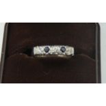 A platinum, sapphire and diamond half eternity ring, set with brilliant cut stones, size K, weight 5