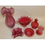 six Victorian Cranberry glassware, to include a twin handled bowl, two other bowls and two vases (