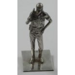 Of British Army interest, a solid silver statue of a soldier, London 1973, dressed in dessert