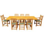 Robert 'Mouseman' Thompson of Kilburn, a large oak refectory table and eight chairs, raised on two