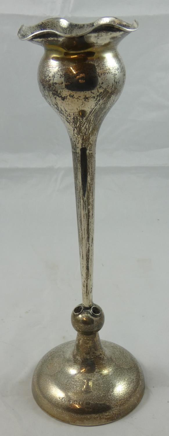 A silver epergne vase, Birmingham 1917, of tulip form, lacking the three flutes, 30 cm, loaded.