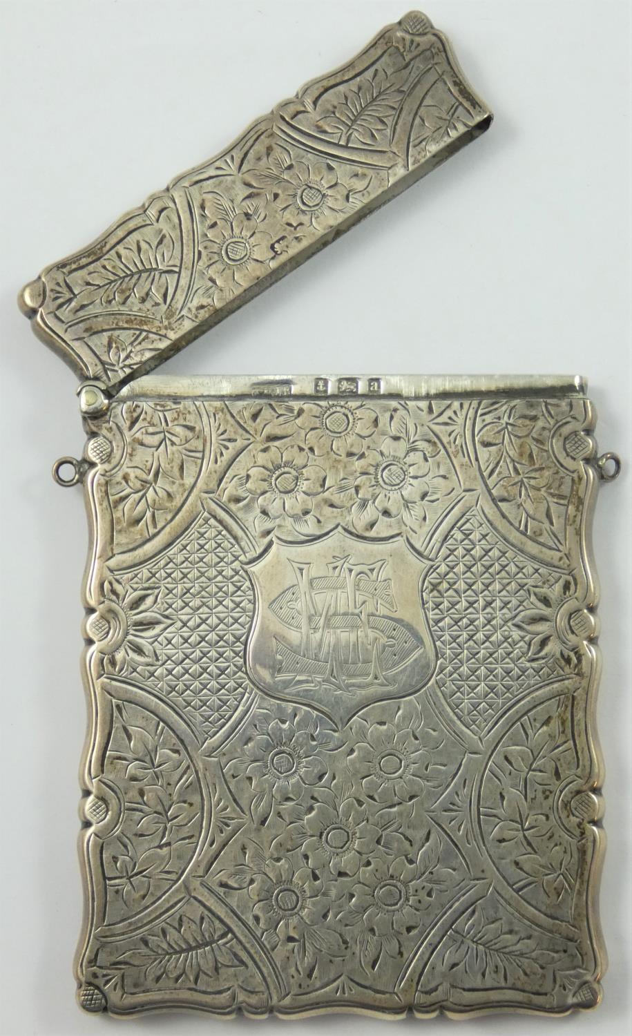 A Victorian silver card case, Birmingham 1900, with all over floral engraved decoration, 10 x 6.5 - Image 2 of 3