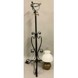 A Victorian copper and wrought iron adjustable stand oil lamp, in the style of W.A.S. Benson, raised