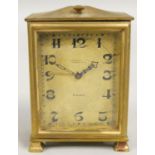 A French 8 day alarm boudoir clock, retailed by J. Sermin, Sheffield, with Arabic numerals,