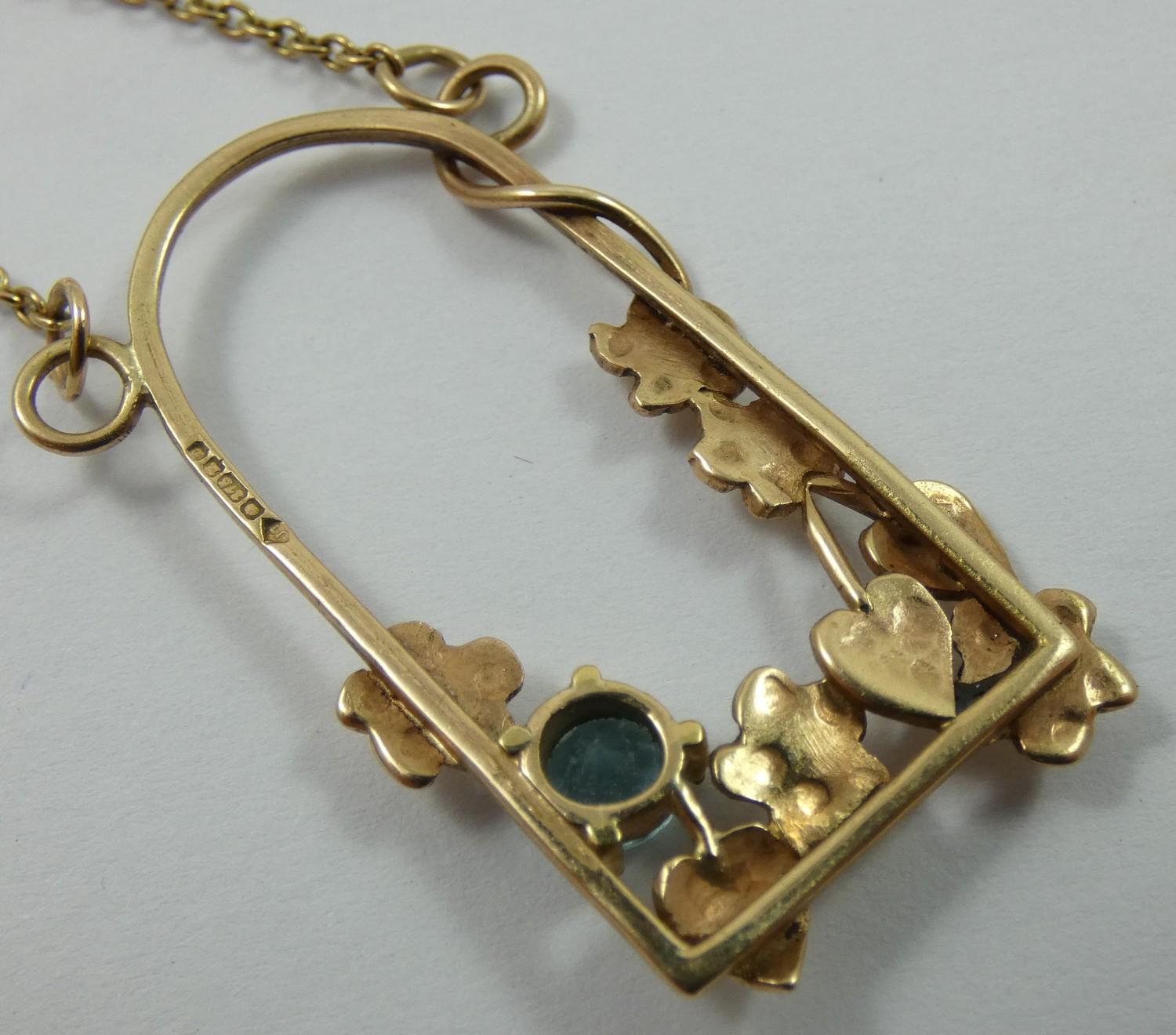 A 9ct gold and blue zircon pendant, in a floral mount, a similar bangle and pair of ear rings, gross - Image 2 of 2