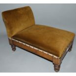 A 19th century mahogany gout stool, the upholstered seat with adjustable support, raised on turned