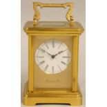 Richard & Cie, a French brass striking carriage clock, the white enamel dial with Roman numerals,