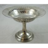 A silver pedestal basket, Sheffield 1911, with pierced bowl raised on a spreading foot, diameter