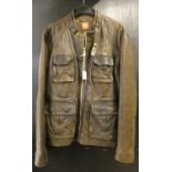 A mens Hugo Boss brown leather jacket.