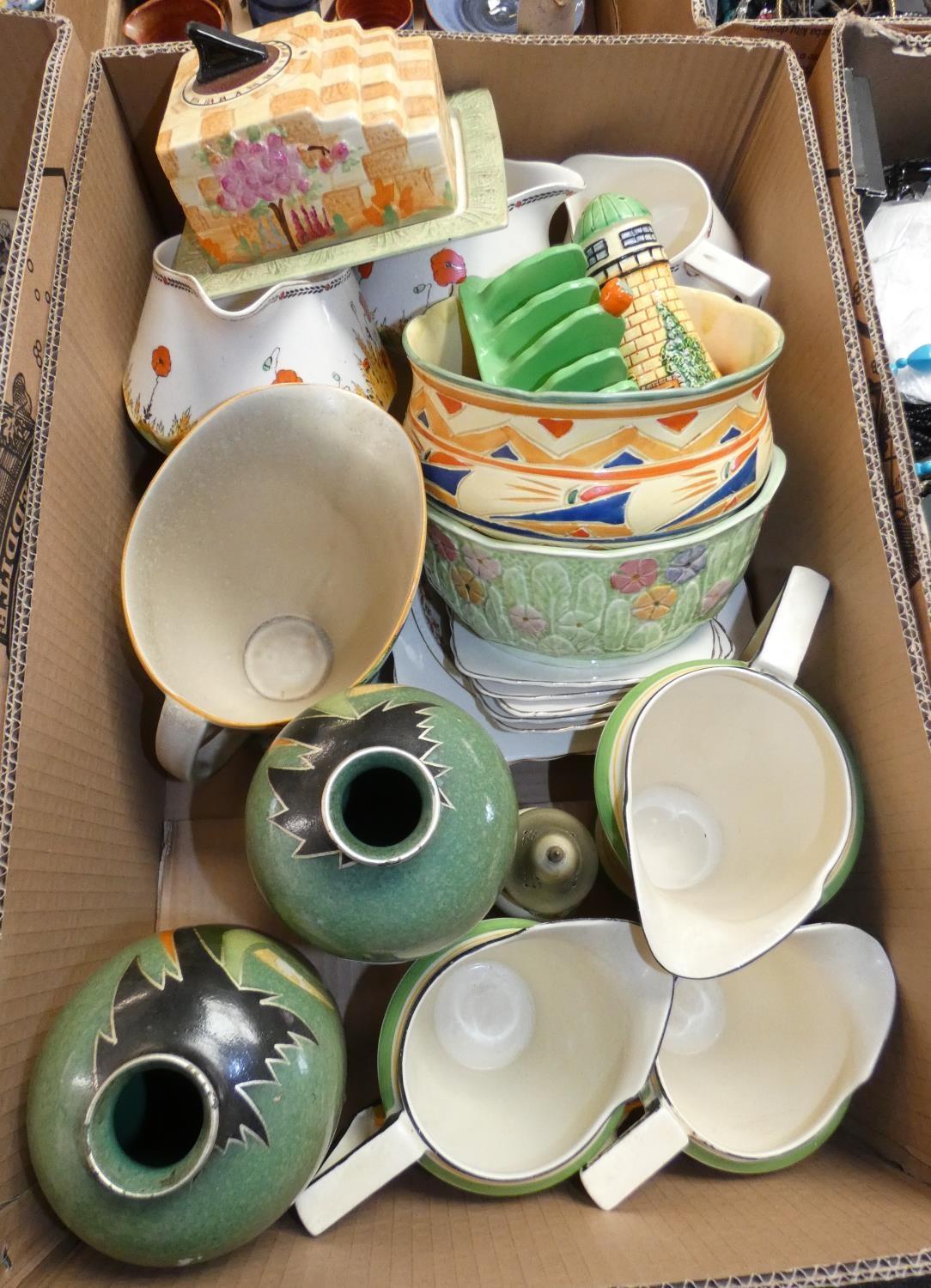 A pair of Brentleigh vases, together with a set of three graduated jugs and other mid 20th century