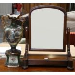 A Victorian mahogany swivel toilet mirror, together with a twin handled vase on stand (2).