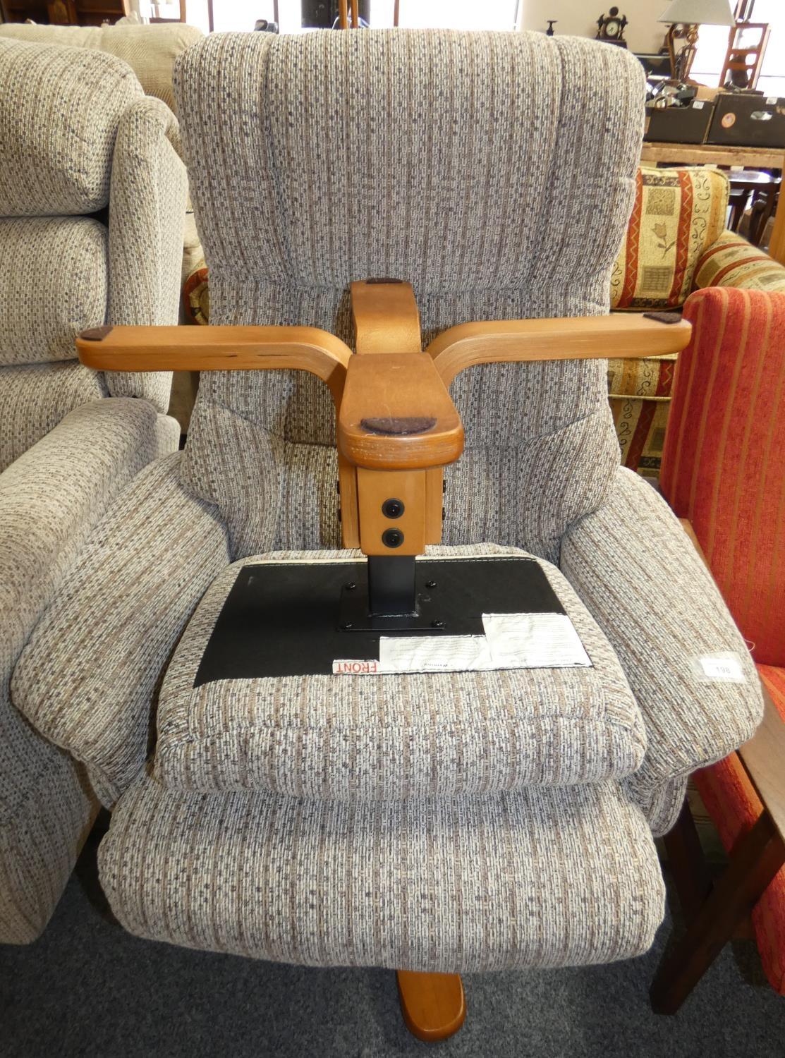 A modern recliner chair with matching stool (2).