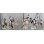 A group of ten figurines, to include a pair of French style dancing lovers with cherubs, Regency