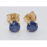 A pair of 9ct gold single stone sapphire ear studs, diameter 5 mm.