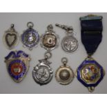 A silver and enamel Rifle Association fob, Birmingham 1916, a football fob, Birmingham 1925 and