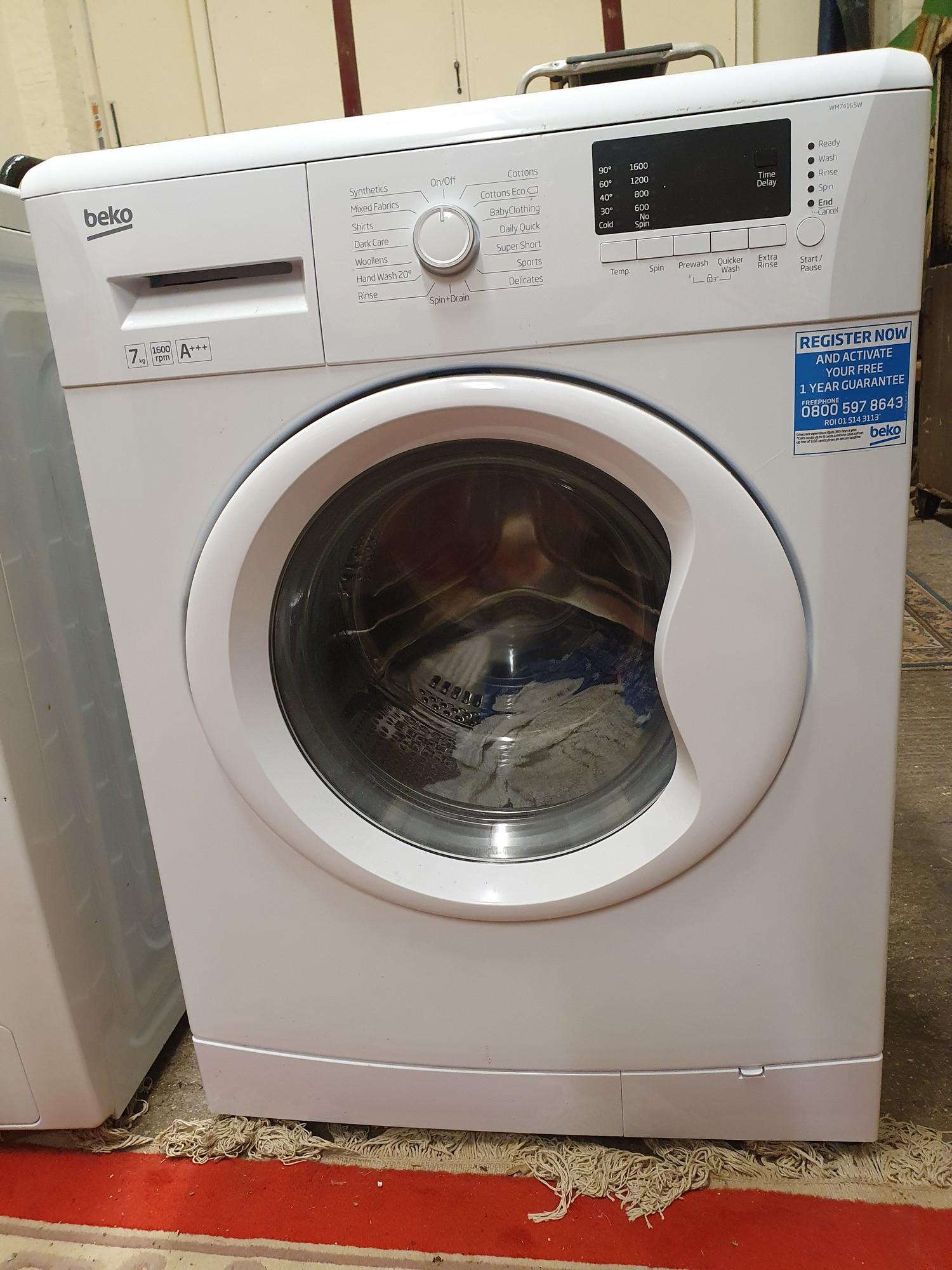 A Beko 7kg washing machine, model WM74165W.