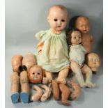 A group of five dolls, to include an Armand Marseille doll marked 'AM Germany 518/8k', height