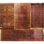 Two machine made Belgium wool carpets, 67 x 250cm and 67 x 135cm, together with another two