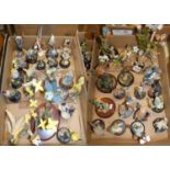 A collection of over forty decorative bird ornaments including 'Country Artists', Royal Crown