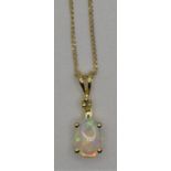 A 10k gold and opal pendant, 9ct gold chain,