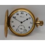 A Record gold plated keyless wind full hunter pocket watch.