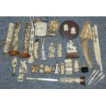 A collection of resin, bone and ivory Okimono, Inrow and other items.