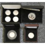 A silver proof First World War commemorative coin, case, a 2013 crown, a 2014 silver crown, case and