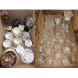 A collection of various drinking glasses, jugs and a decanter, together with glass spirit lamps,