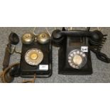 A black dial 332L telephone together with a wall mounting dial telephone EC29 (2).