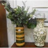 A green and cream vase, 52 cm high together with a West German green and brown vase 42 cm high (2).