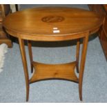 An Edwardian mahogany inlaid oval occasional table with under tier