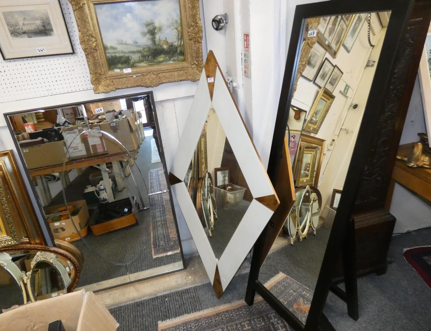 A black framed easel dressing mirror, a modern diamond shaped mirror and a rectangular mirror (3).