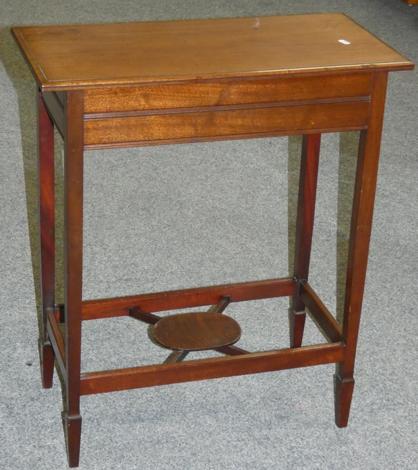 A mahogany side table.