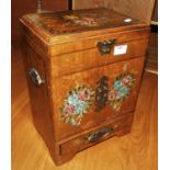 A twin handled jewellery box, with hinged lid, two doors to three drawer interior over a bottom